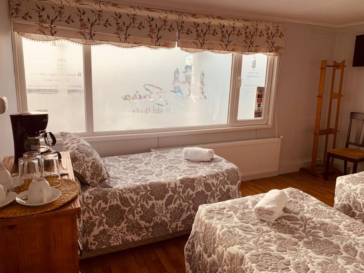 Arte Brisa Hostal Boutique Пуэрто-Наталес Экстерьер фото