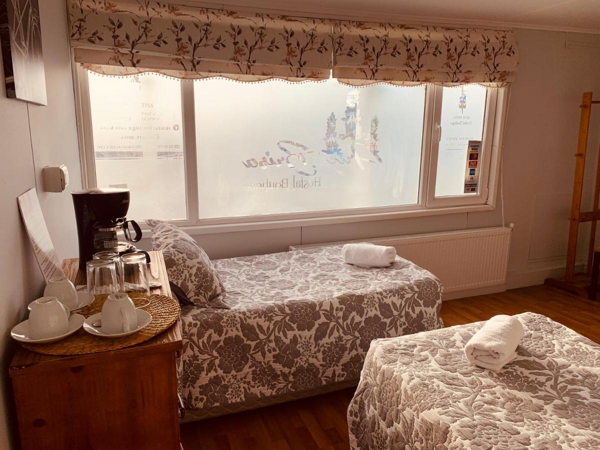 Arte Brisa Hostal Boutique Пуэрто-Наталес Экстерьер фото