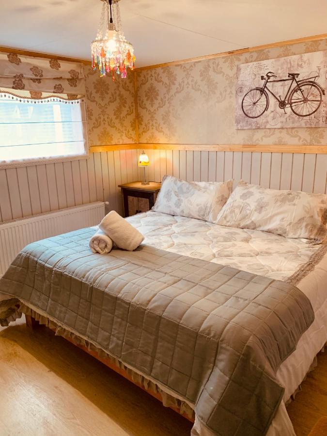 Arte Brisa Hostal Boutique Пуэрто-Наталес Экстерьер фото