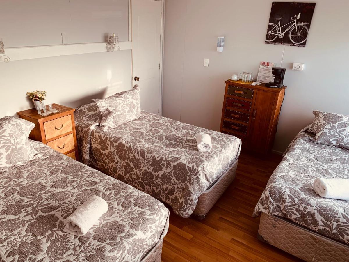 Arte Brisa Hostal Boutique Пуэрто-Наталес Экстерьер фото