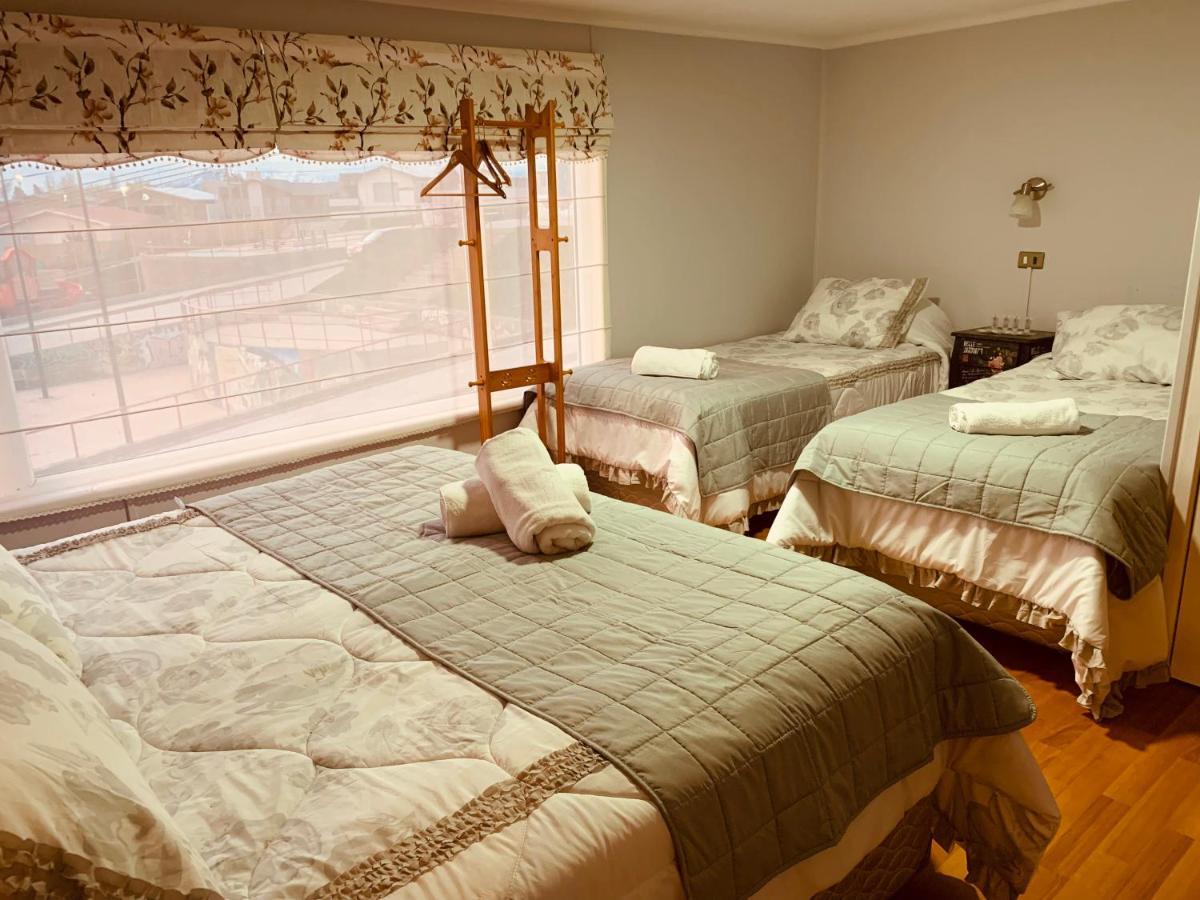 Arte Brisa Hostal Boutique Пуэрто-Наталес Экстерьер фото